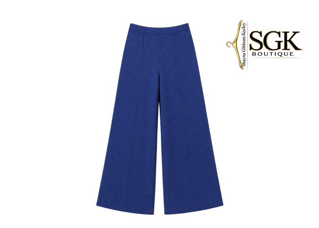 Blue pants on a white background with SGK Boutique logo.