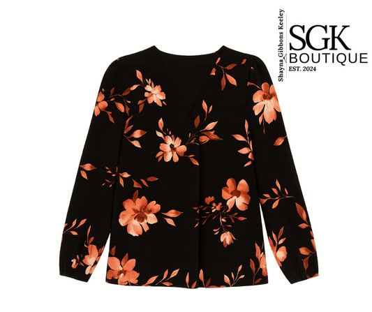Black long-sleeve top with floral pattern on a white background, featuring SGK Boutique logo.
