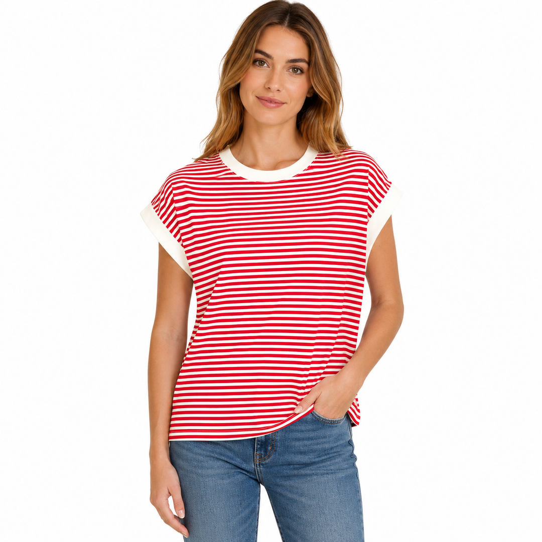 Woman wearing a red and white striped shirt with blue jeans on a white background