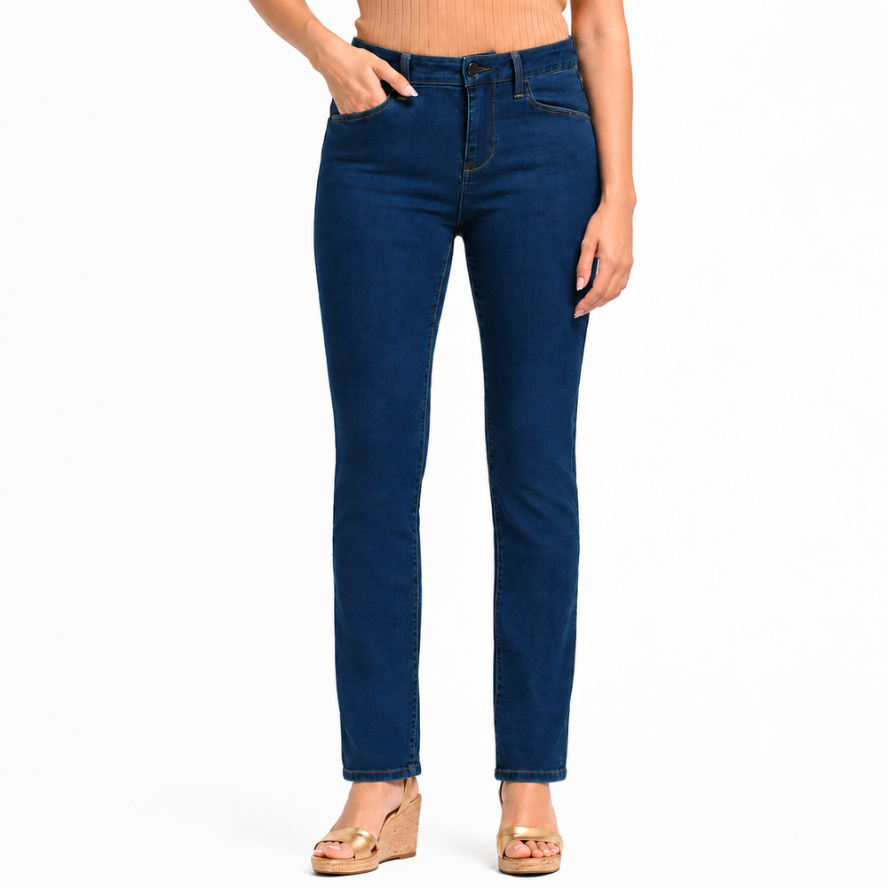 A model wearing dark blue slim-fit jeans with a straight leg, paired with a beige ribbed top and gold wedge sandals, shown from the waist down on a white background.