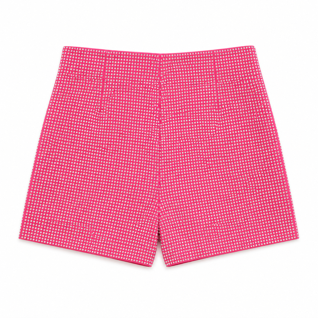 Pink shorts with a subtle pattern on a white background