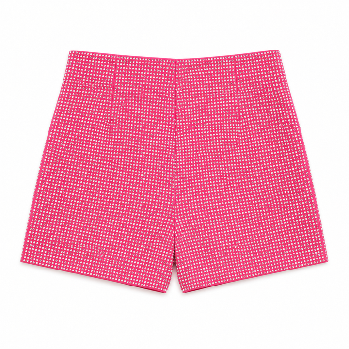 Pink shorts with a subtle pattern on a white background