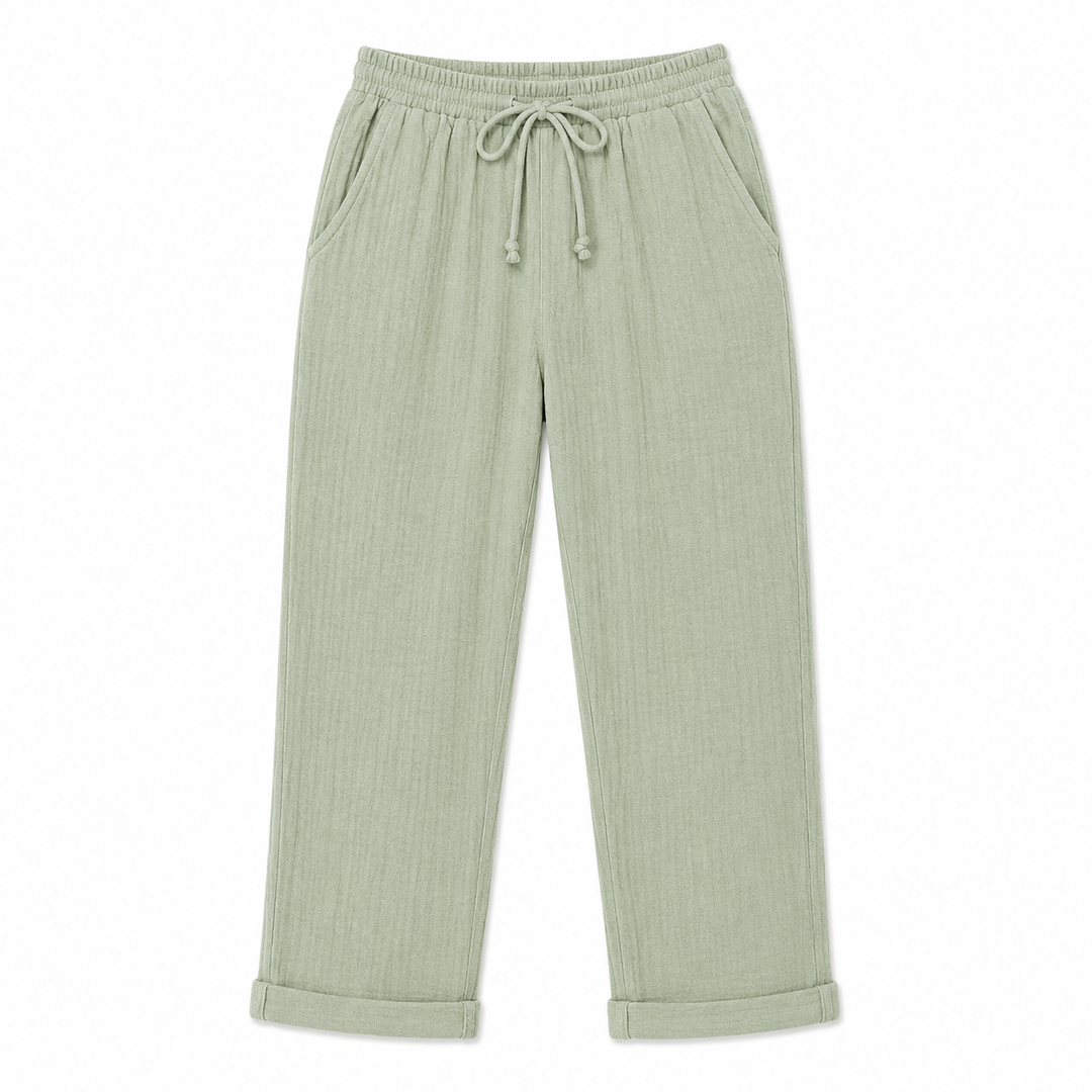 Light green pants with drawstring on a white background