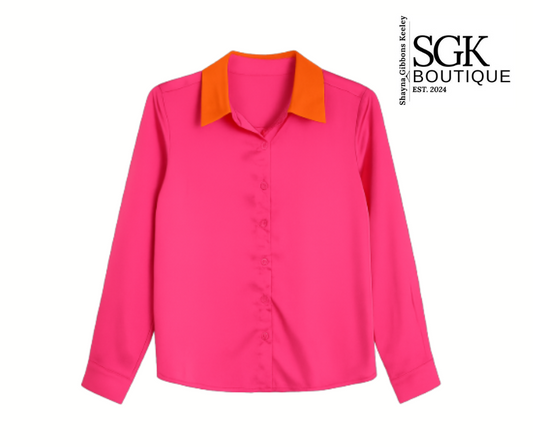 Pink shirt with orange collar on a white background, featuring SGK Boutique logo.