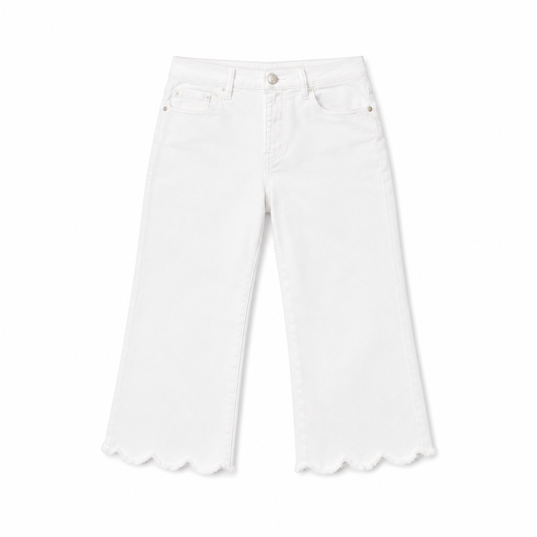 White pants with scalloped hem on a white background