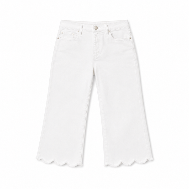 White pants with scalloped hem on a white background