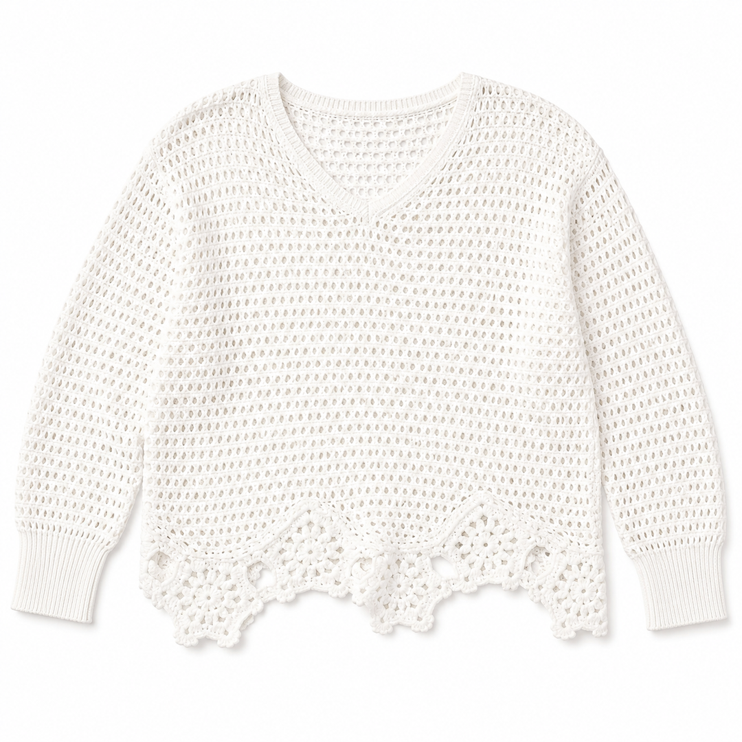 White crochet sweater on a white background