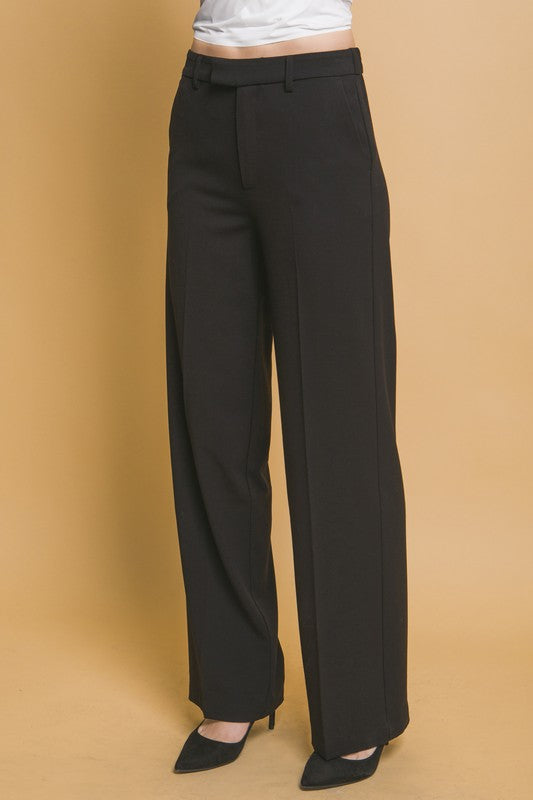Dress pants on a woman.