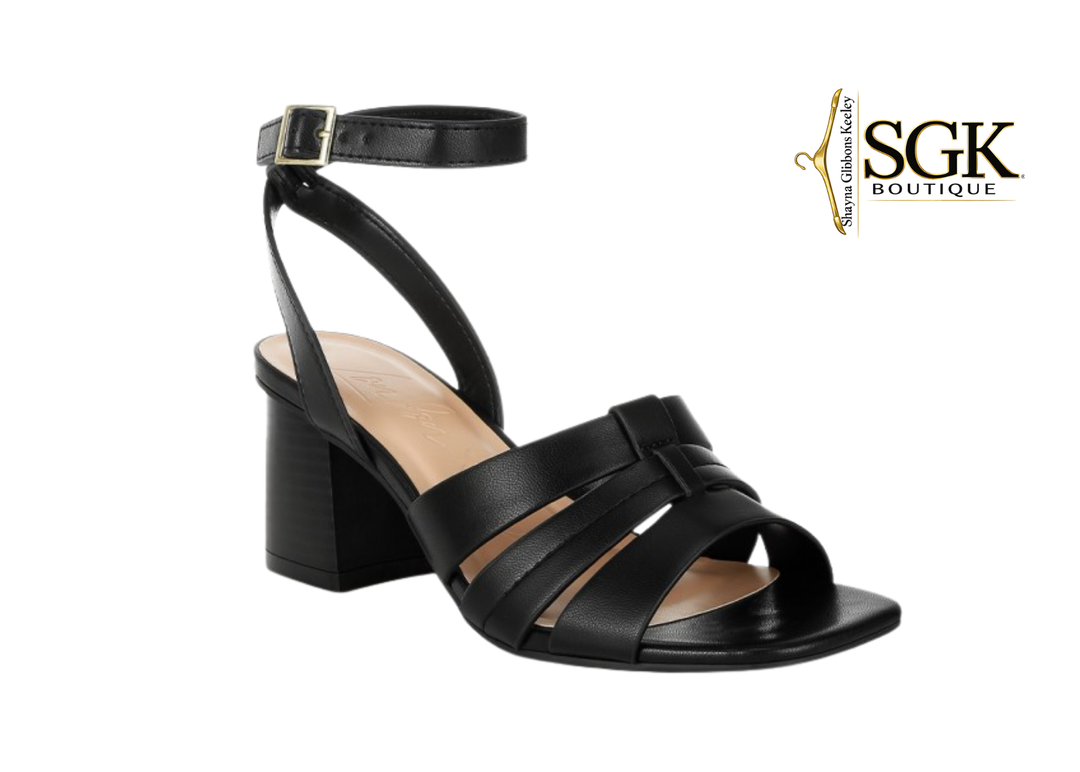 Black sandal with block heel on a white background, featuring SGK Boutique logo.