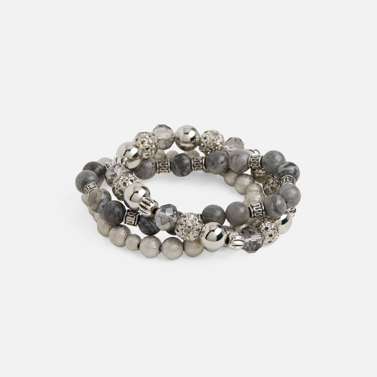 Stack of gray beaded bracelets on a white background