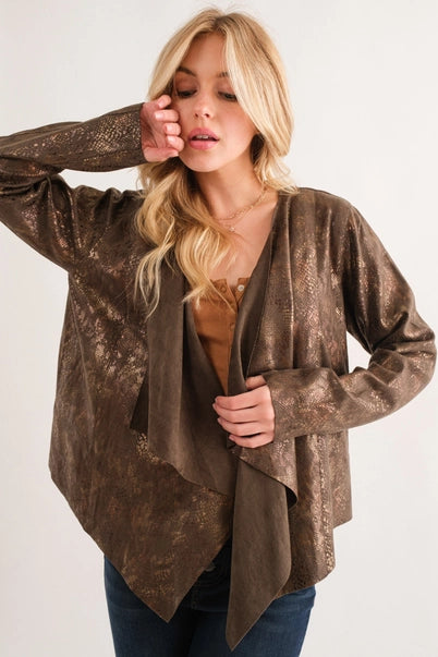 Woman wearing a brown textured cardigan on a white background