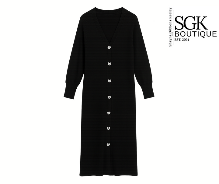 Black cardigan with buttons on a white background, featuring SGK Boutique logo.