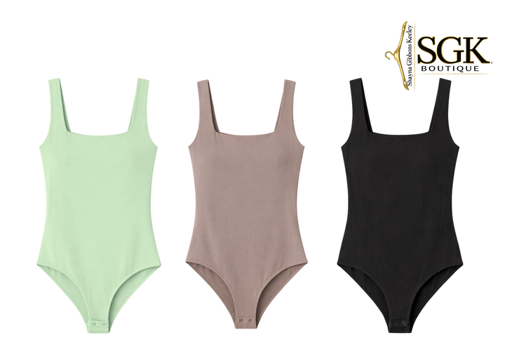 Three swimsuits in green, brown, and black on a white background with SGK Boutique logo.