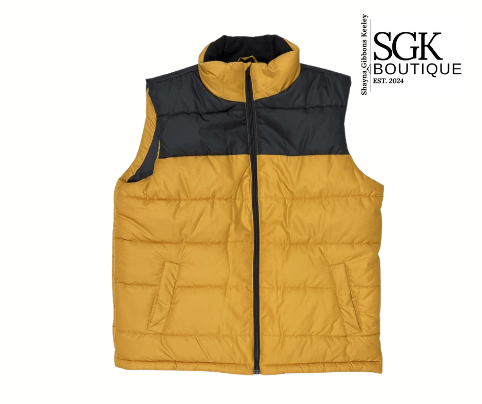 Yellow puffer vest with black collar and zipper on a white background, featuring SGK Boutique logo.