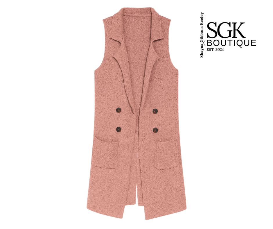 Pink vest with black buttons on a white background, featuring SGK Boutique logo.