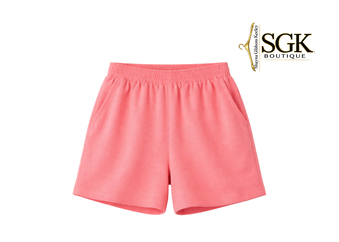 Coral Pink shorts on a white background with SGK Boutique logo.