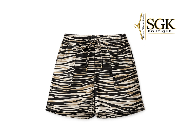 Zebra print shorts on a white background with SGK Boutique logo.